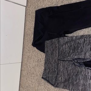 two pairs of arie leggings